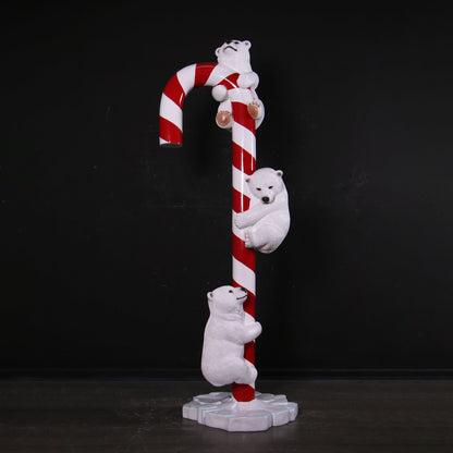 Polar Bear Cubs on Candy Cane Statue