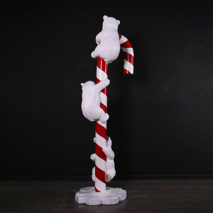 Polar Bear Cubs on Candy Cane Statue