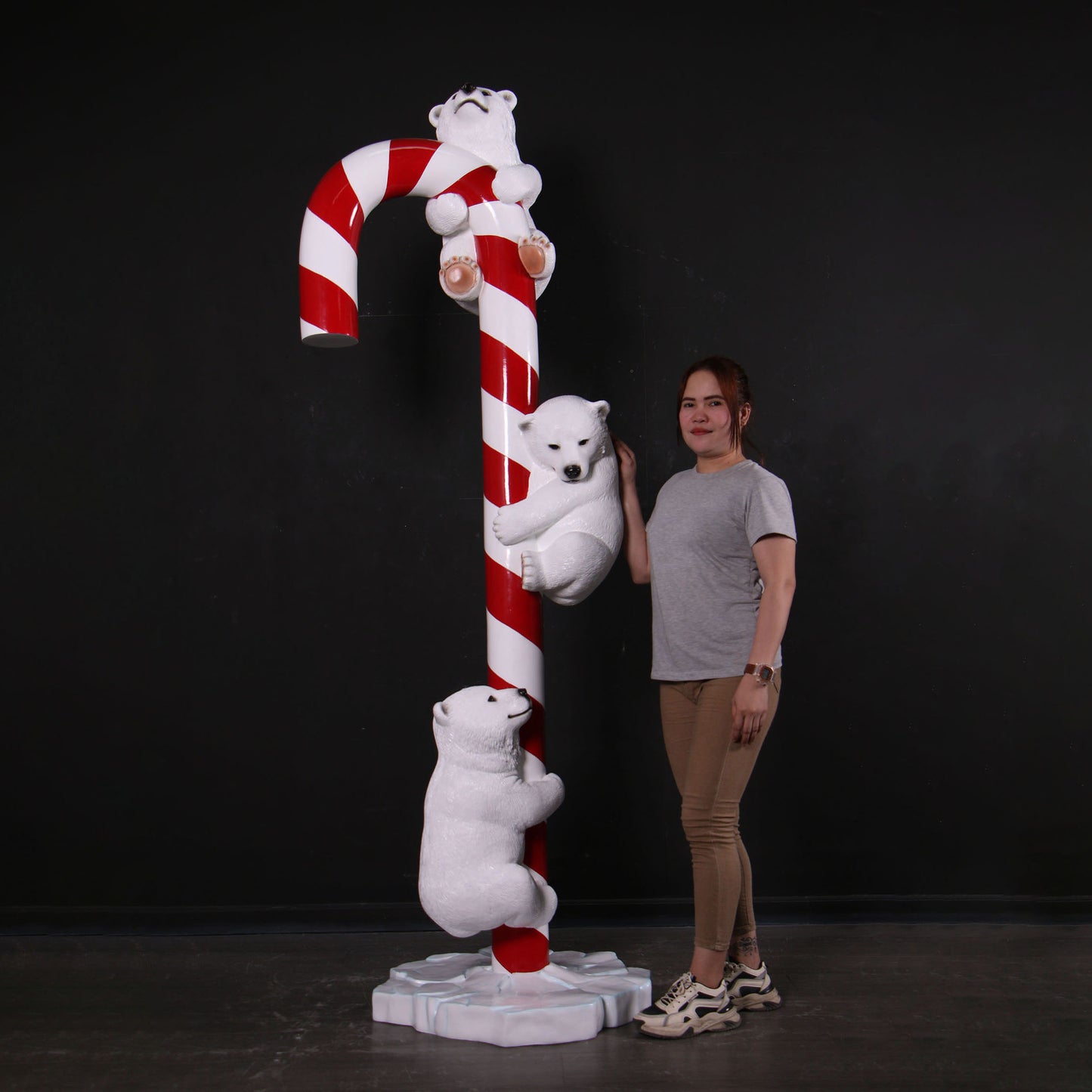 Polar Bear Cubs on Candy Cane Statue