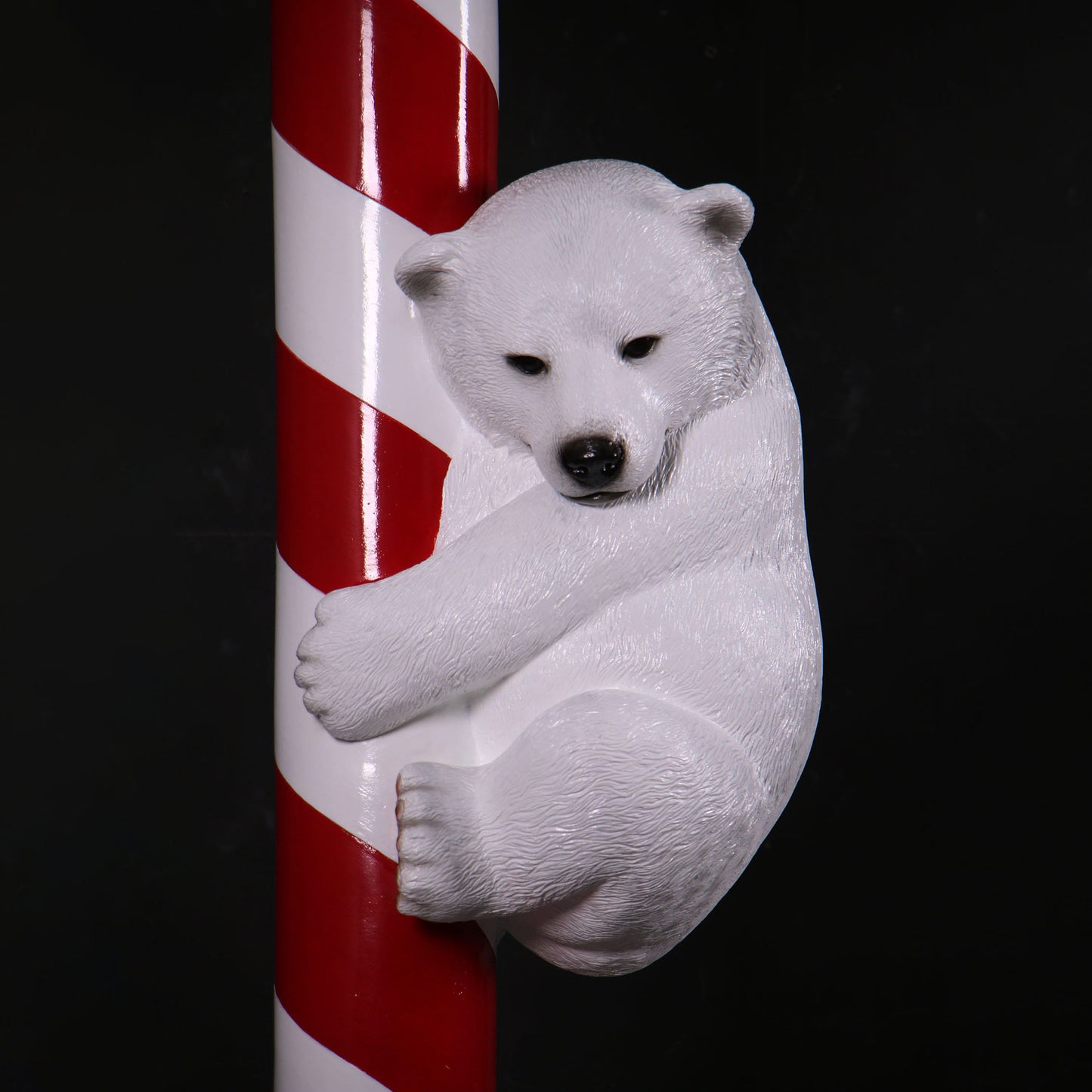 Polar Bear Cubs on Candy Cane Statue