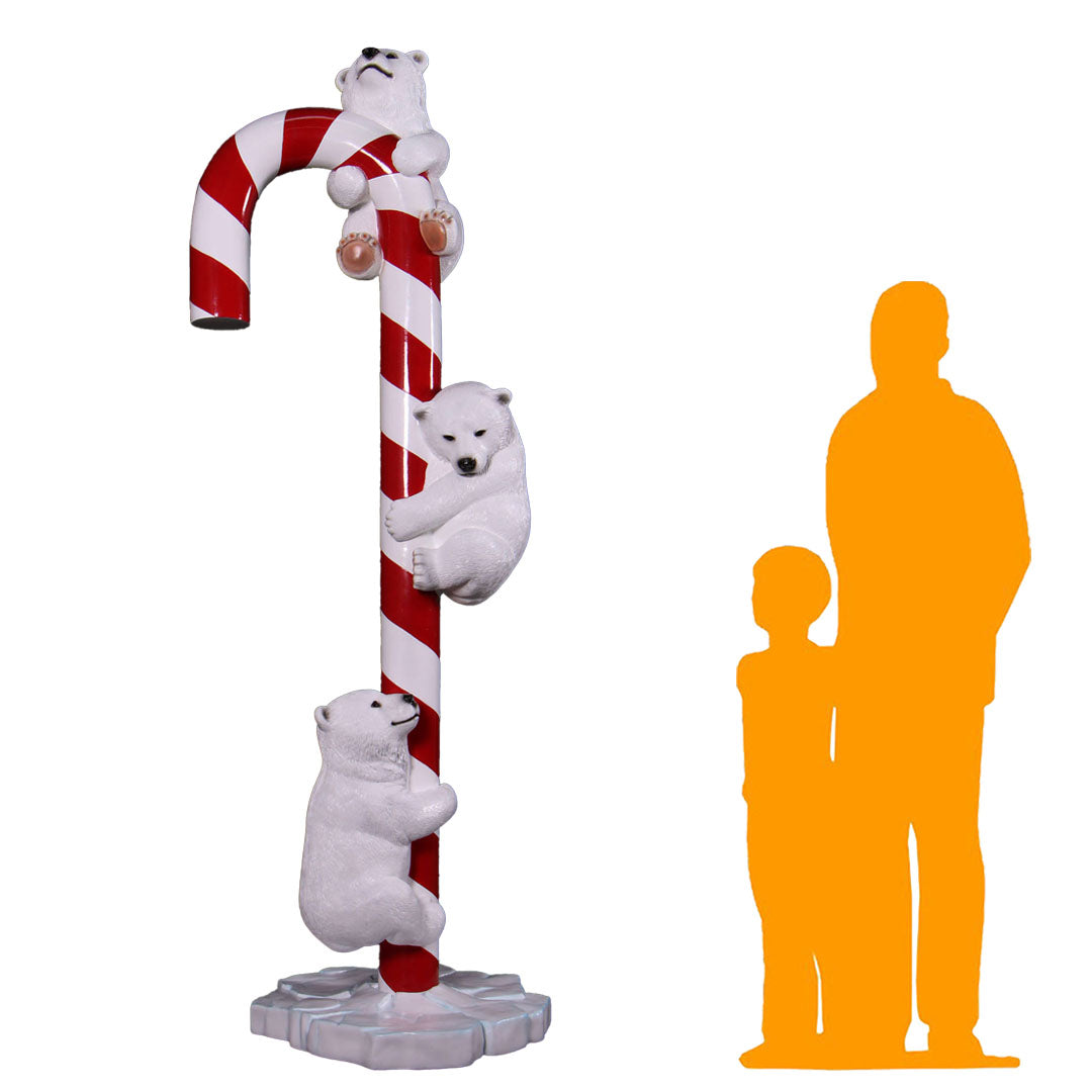 Polar Bear Cubs on Candy Cane Statue