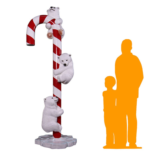 Polar Bear Cubs on Candy Cane Statue