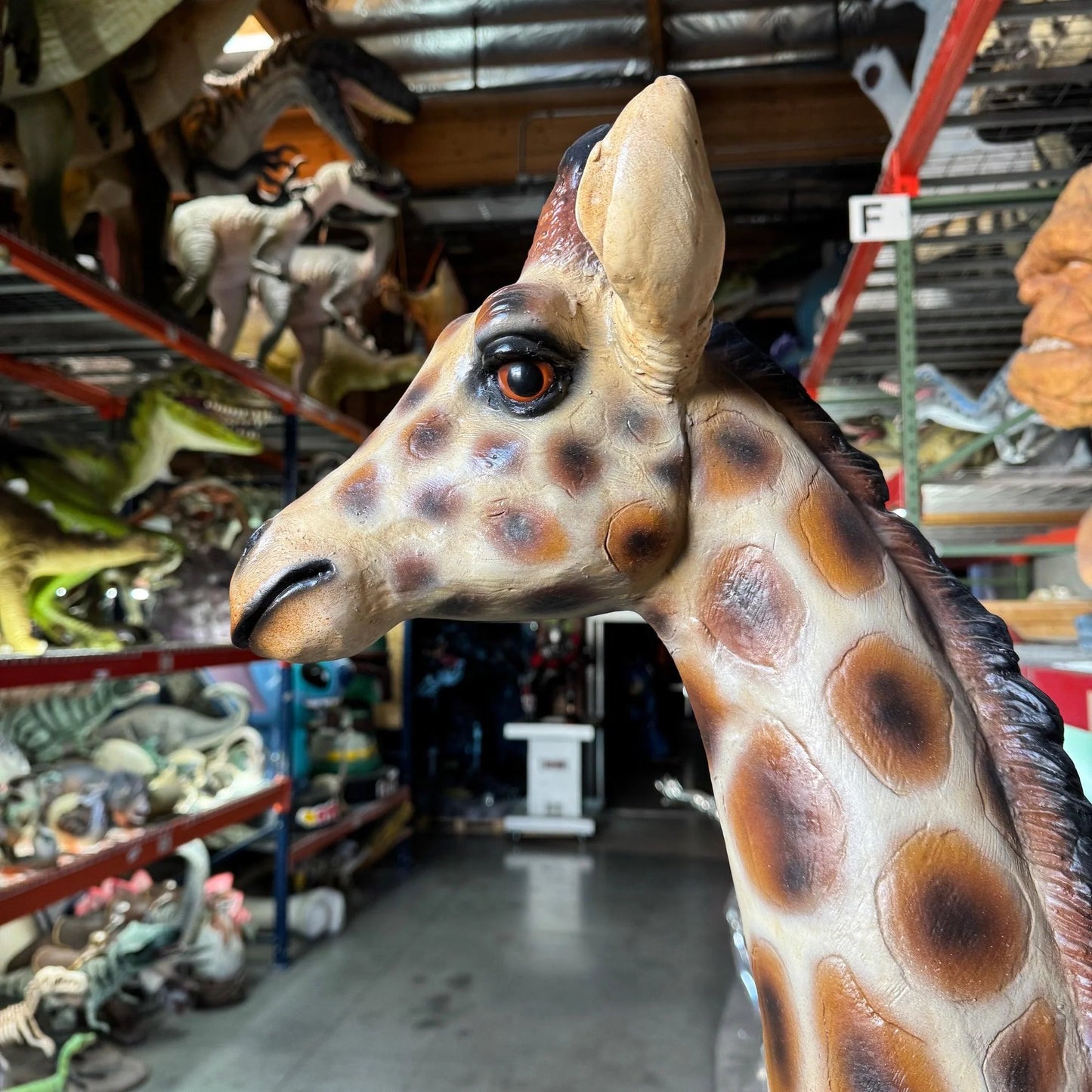 Teen Giraffe Statue