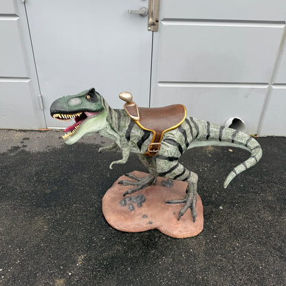 Small T-Rex Dinosaur With Saddle Statue