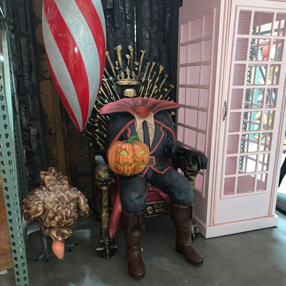 Headless Pumpkin Man Sitting Statue