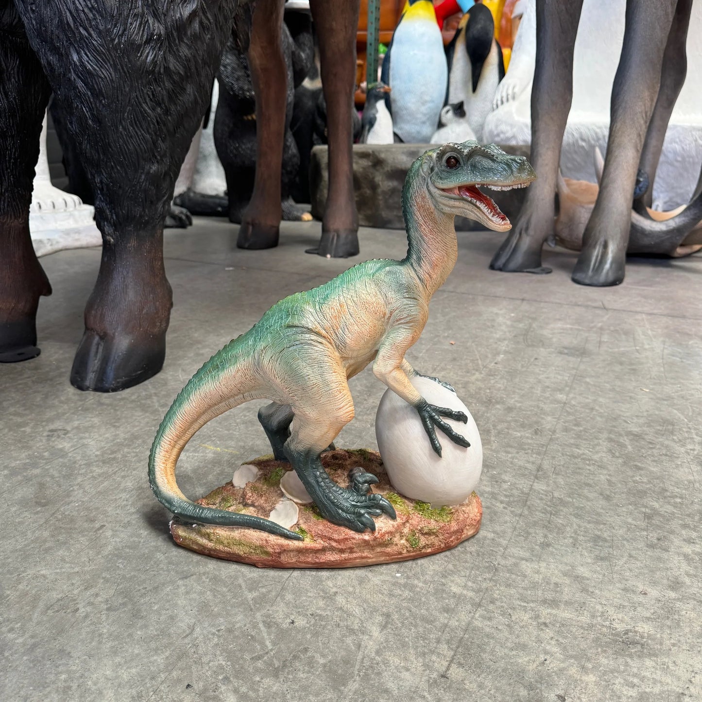 Small Raptor With Egg Statue