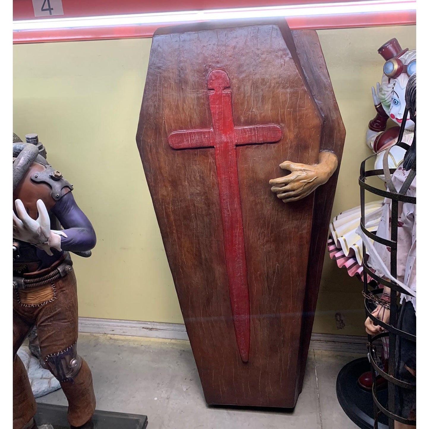 Coffin With Hand Statue - LM Treasures Prop Rentals 