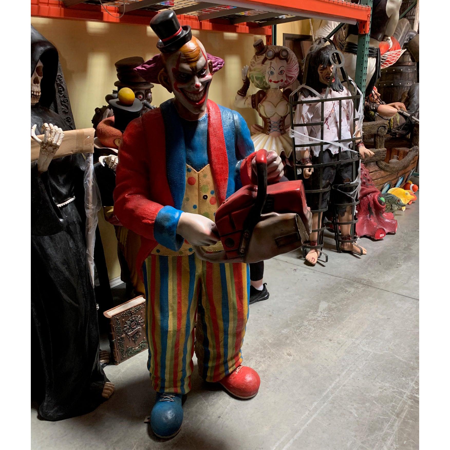 Scary Clown With Chainsaw Statue - LM Treasures Prop Rentals 