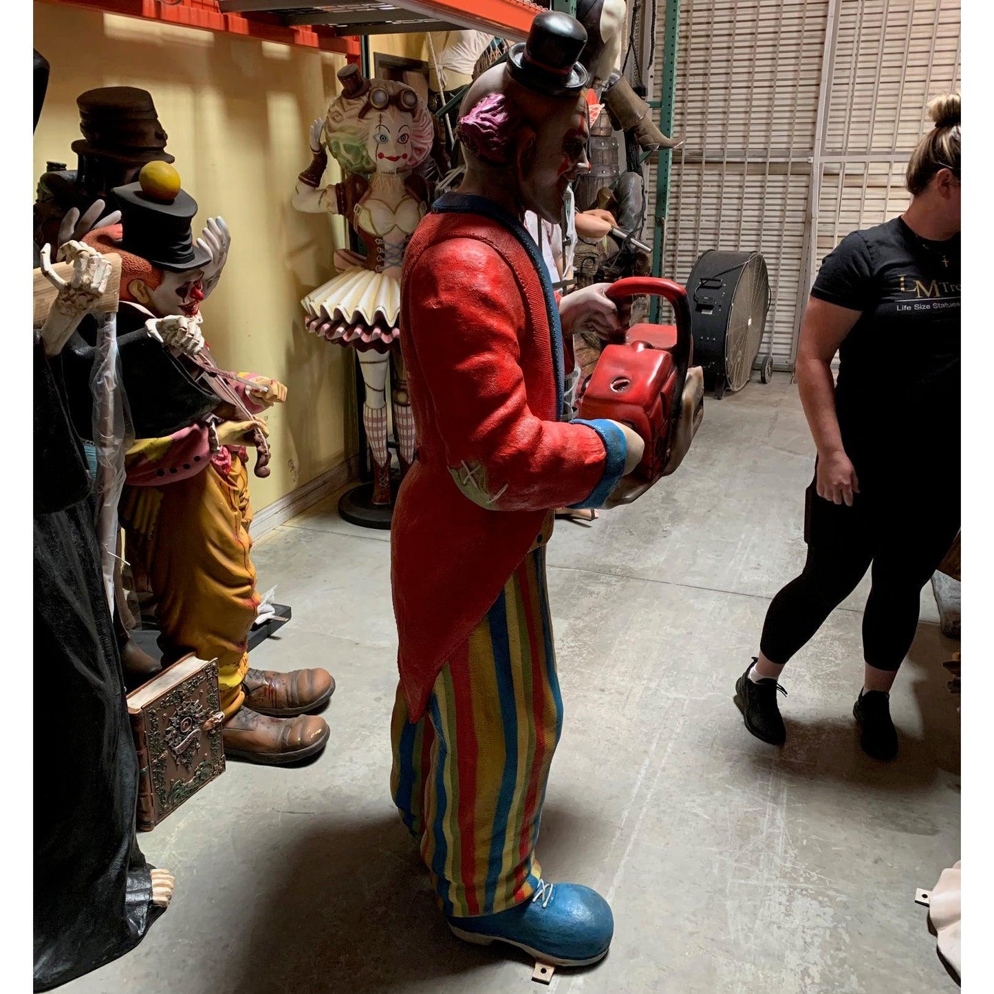 Scary Clown With Chainsaw Statue - LM Treasures Prop Rentals 