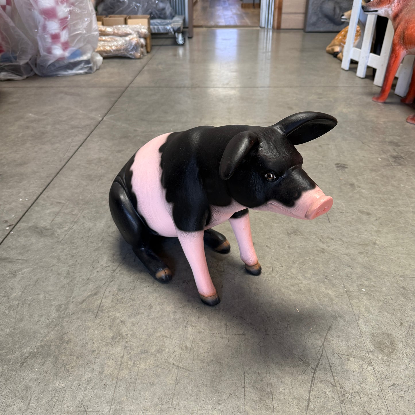 Baby Sitting Black And Pink Pig Statue