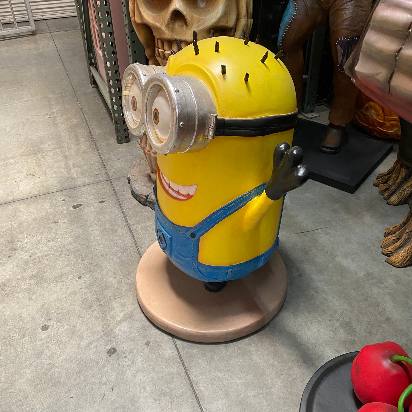 Cartoon Yellow Puppet Waving Minion Statue