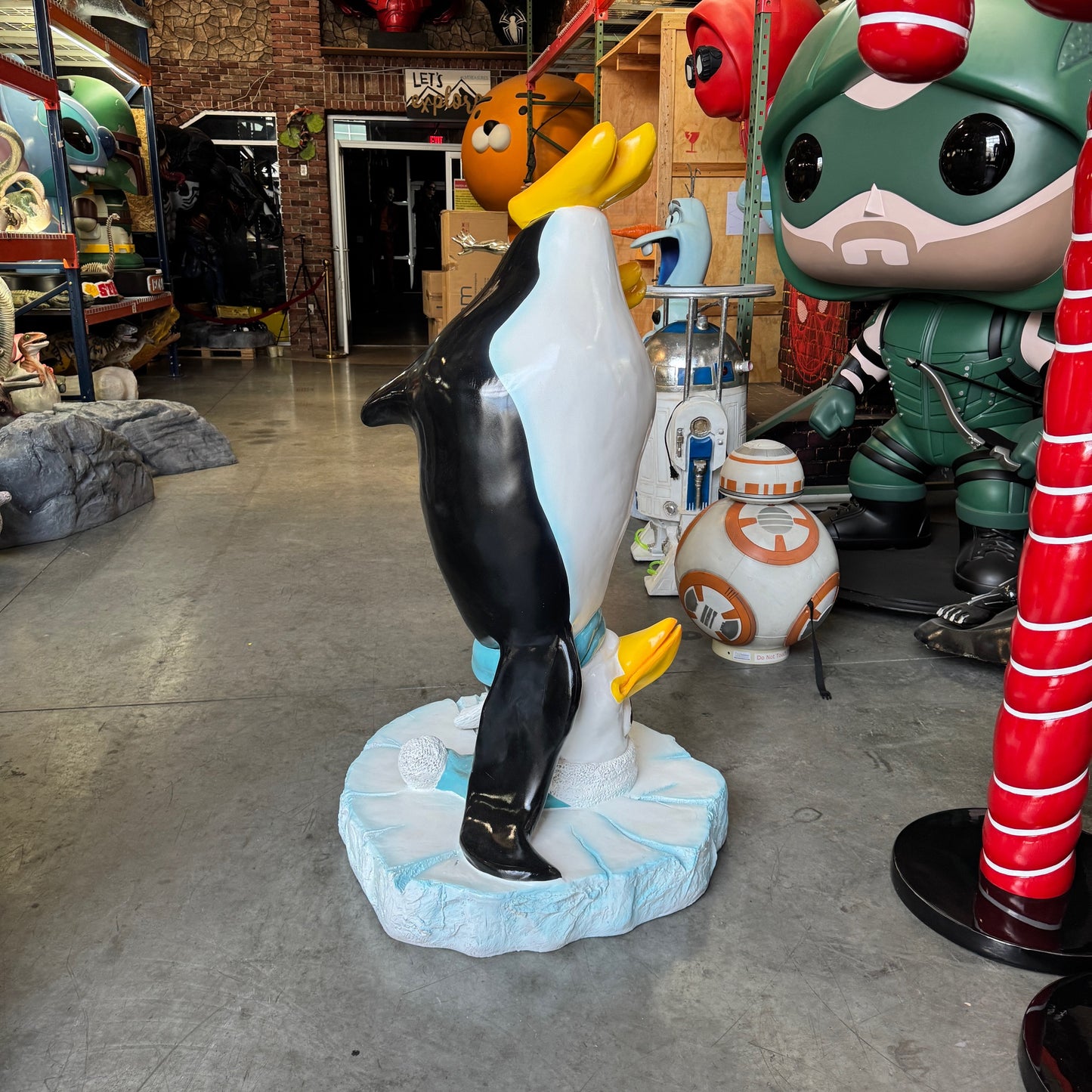 Comic Penguin Upside Down Statue