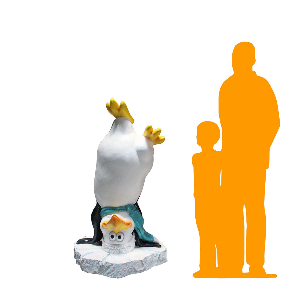 Comic Penguin Upside Down Statue