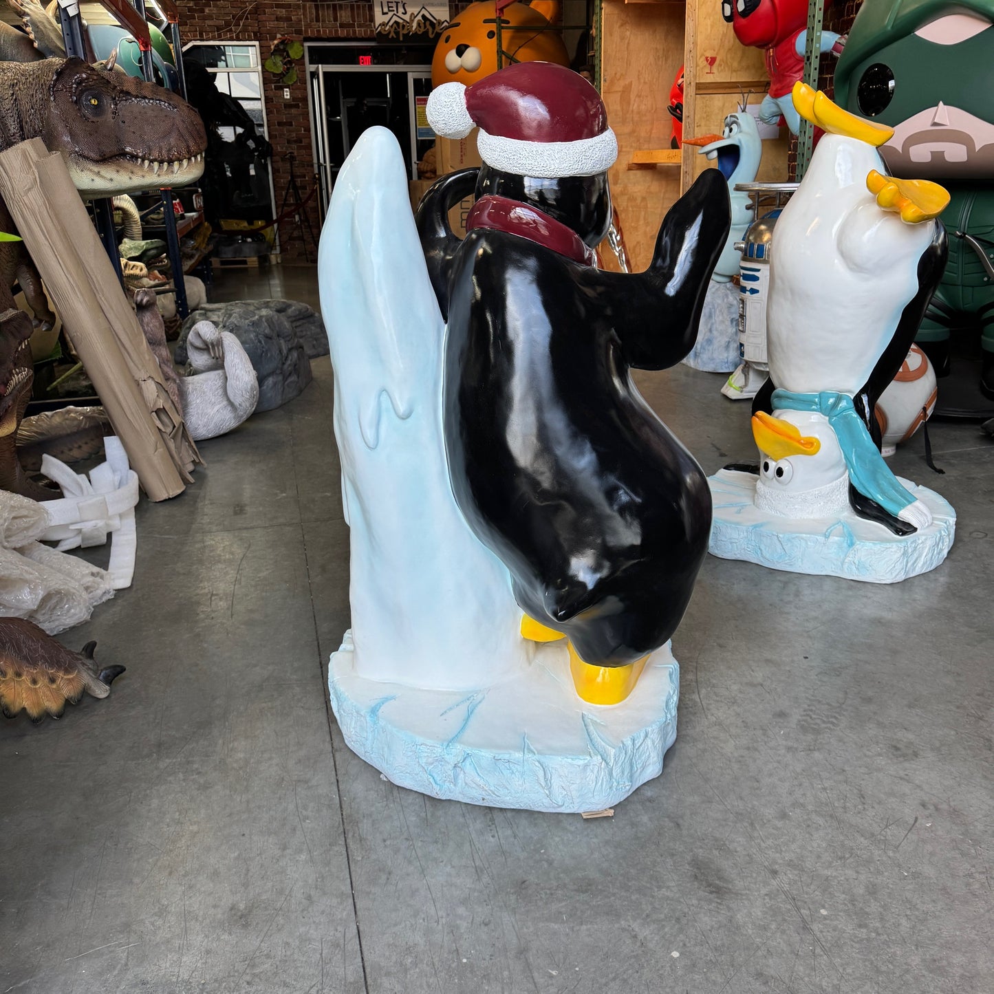 Comic Penguin On Iceberg Statue