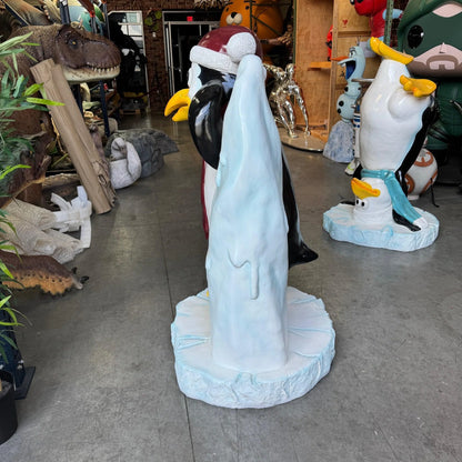 Comic Penguin On Iceberg Statue