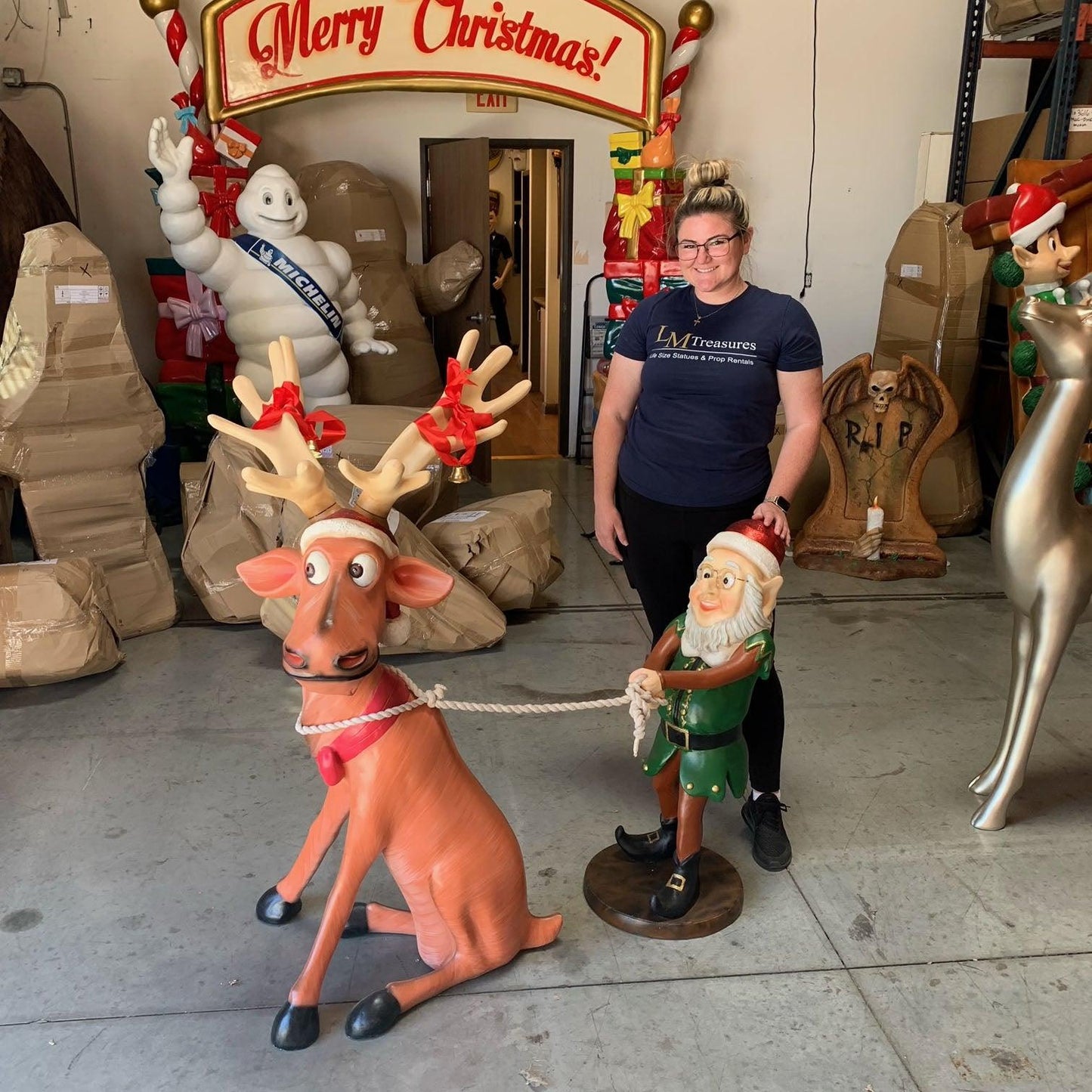 Elf Pulling Funny Reindeer Statue - LM Treasures Prop Rentals 