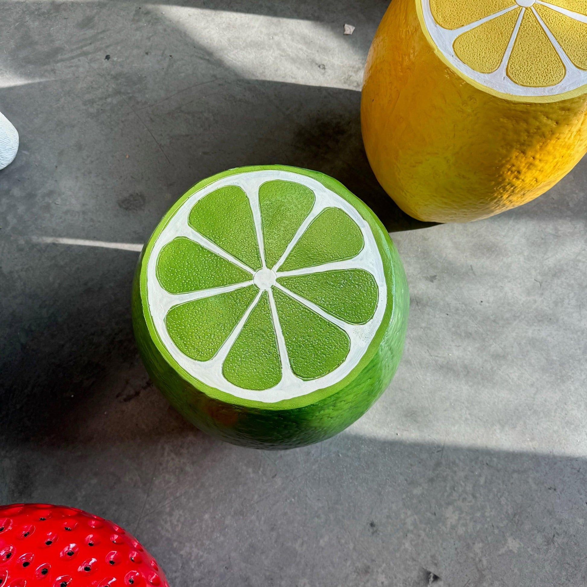 Lime Table Stool Statue - LM Treasures Prop Rentals 