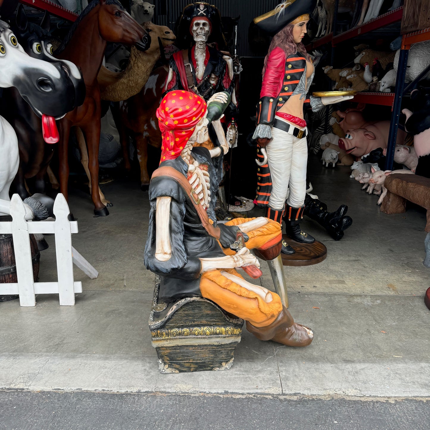 Skeleton Pirate on Treasure Drinking Life Size Statue