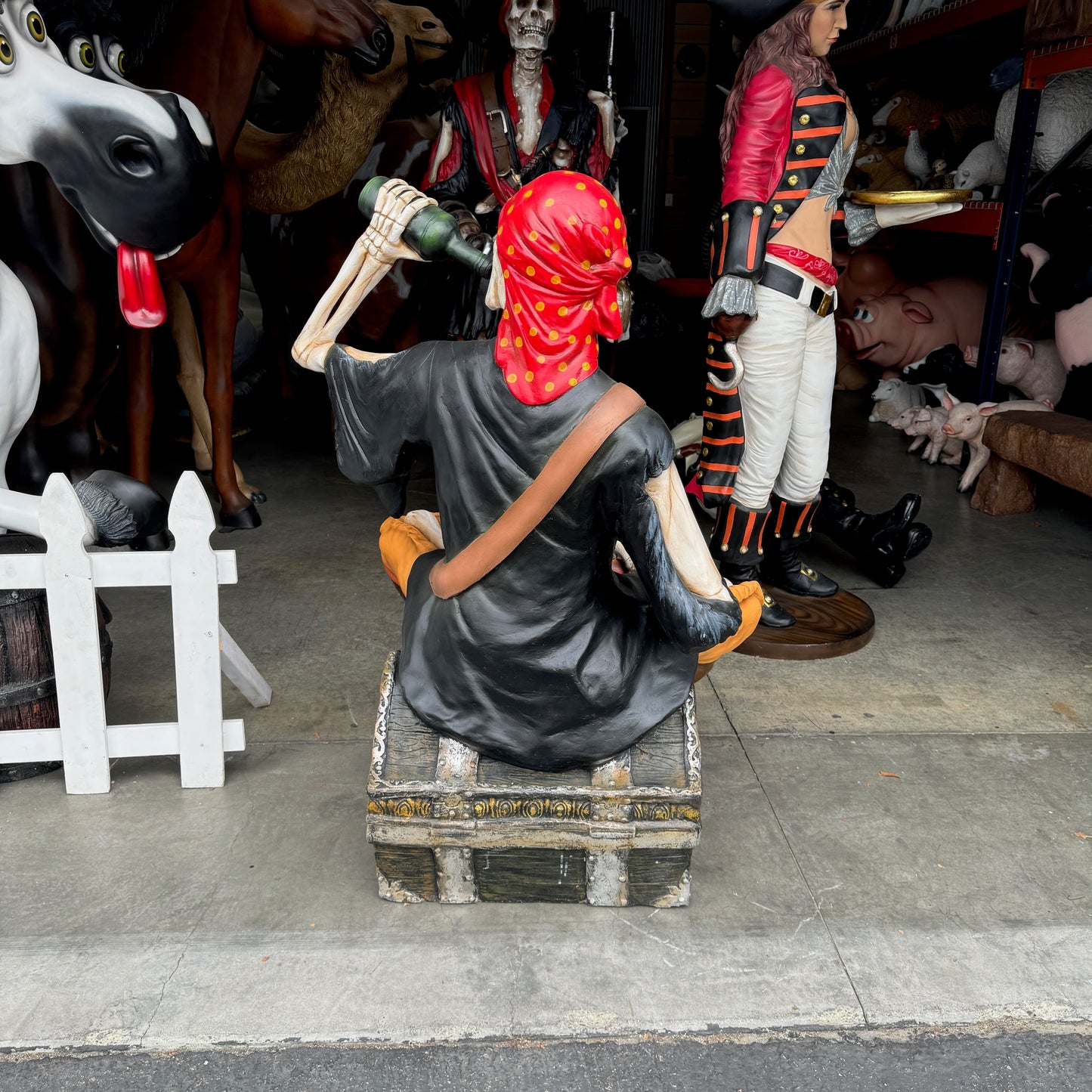 Skeleton Pirate on Treasure Drinking Life Size Statue