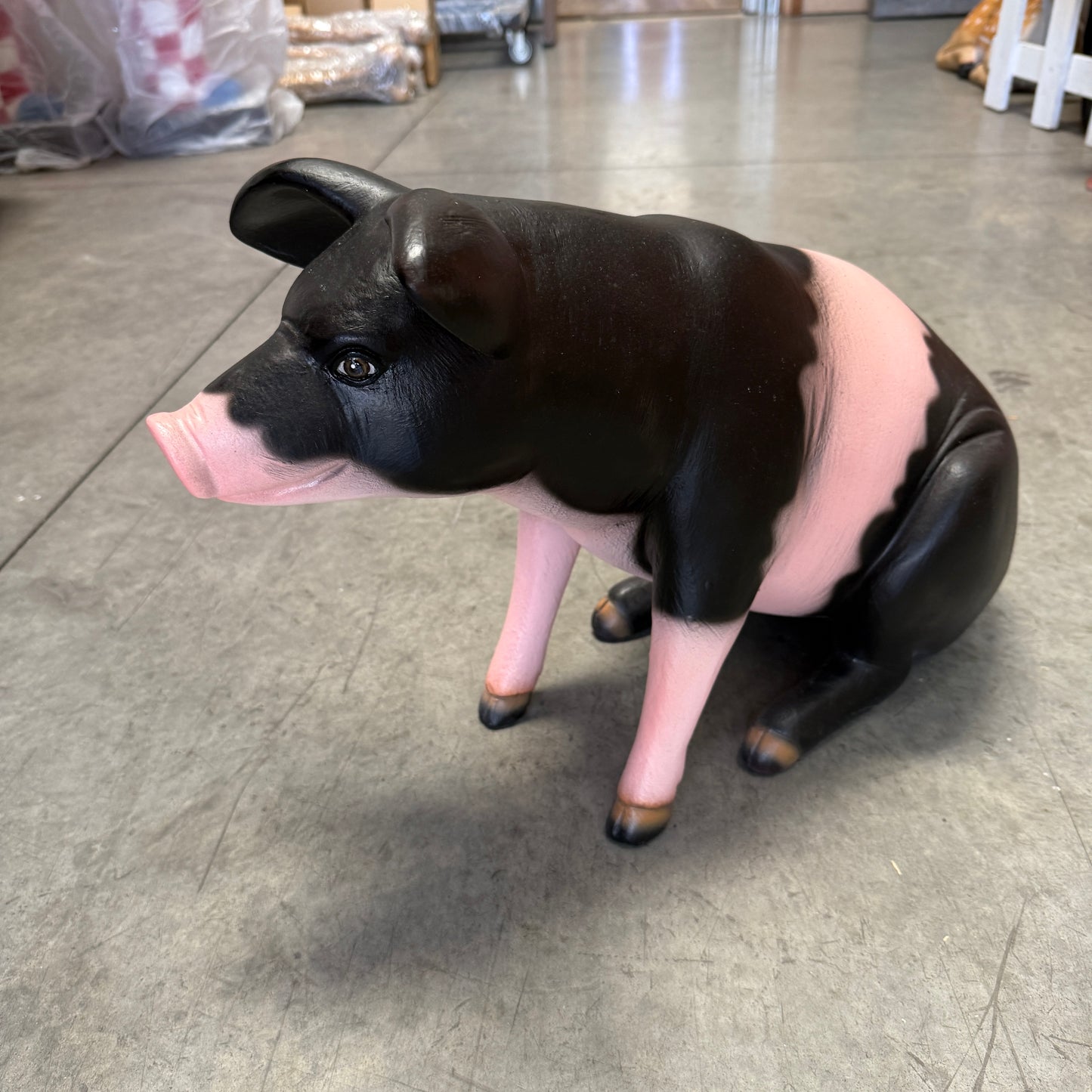 Baby Sitting Black And Pink Pig Statue