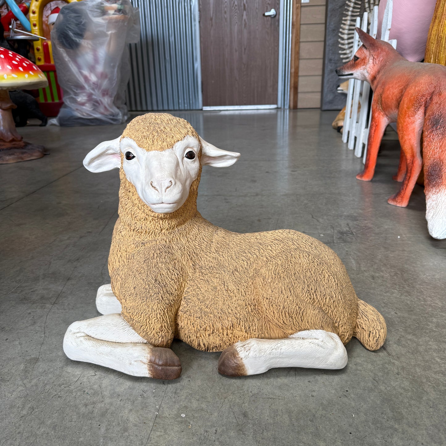 Baby Resting Merino Lamb Statue