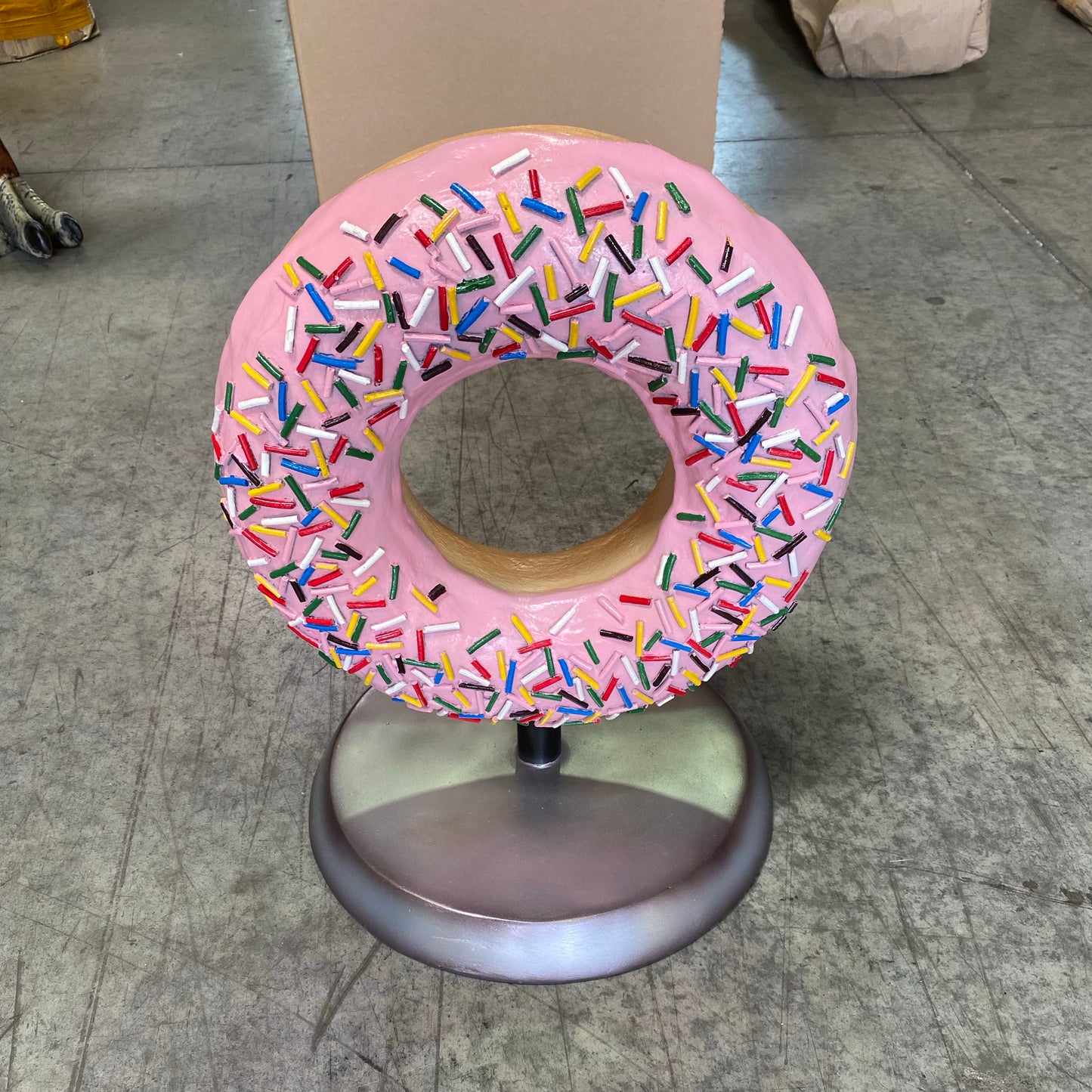 Pink Donut On Stand Statue