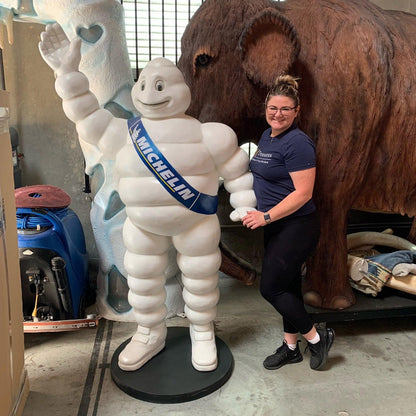 Tire Man Waving Life Size Statue