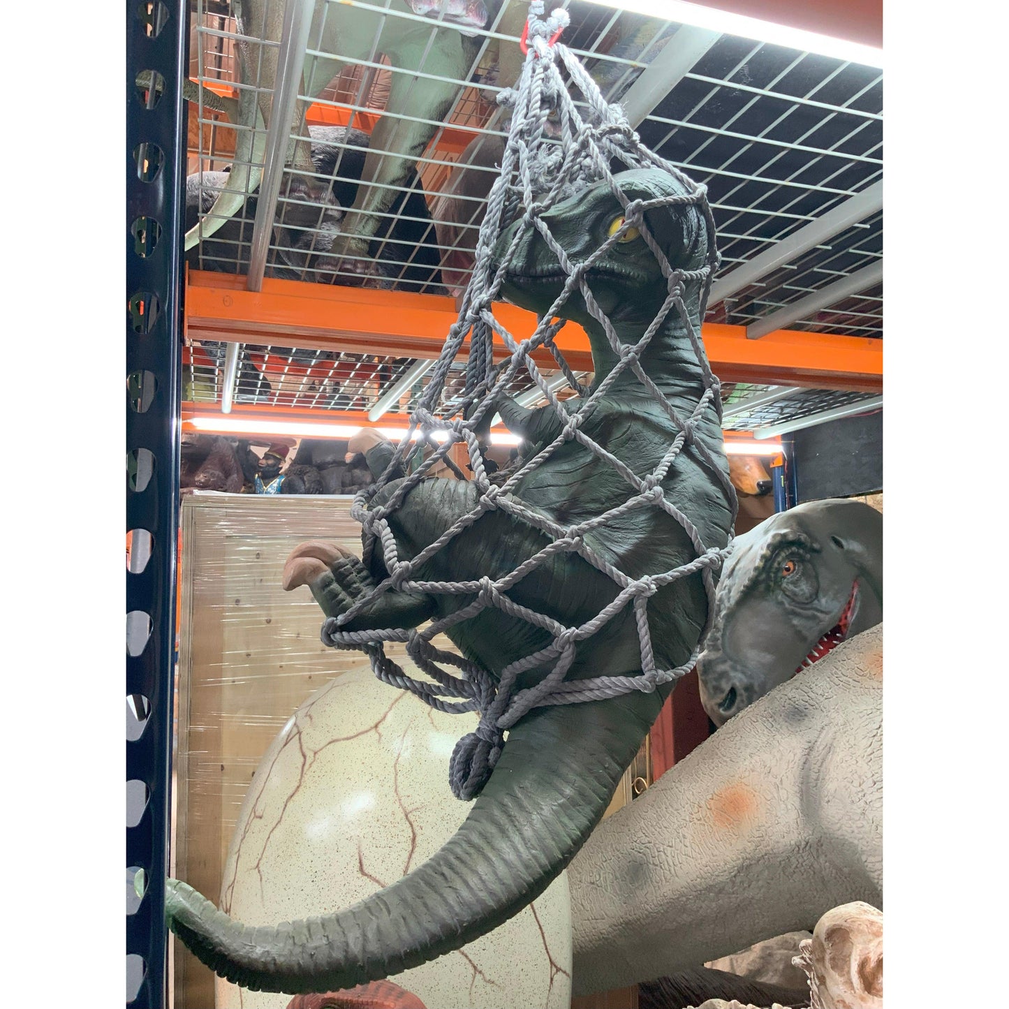 Hanging Baby T-Rex Dinosaur Statue - LM Treasures Prop Rentals 