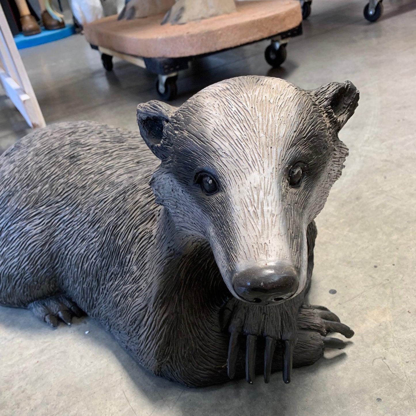 Laying Badger Statue