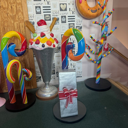 Swirl Rainbow Candy Cane With Gift Statue