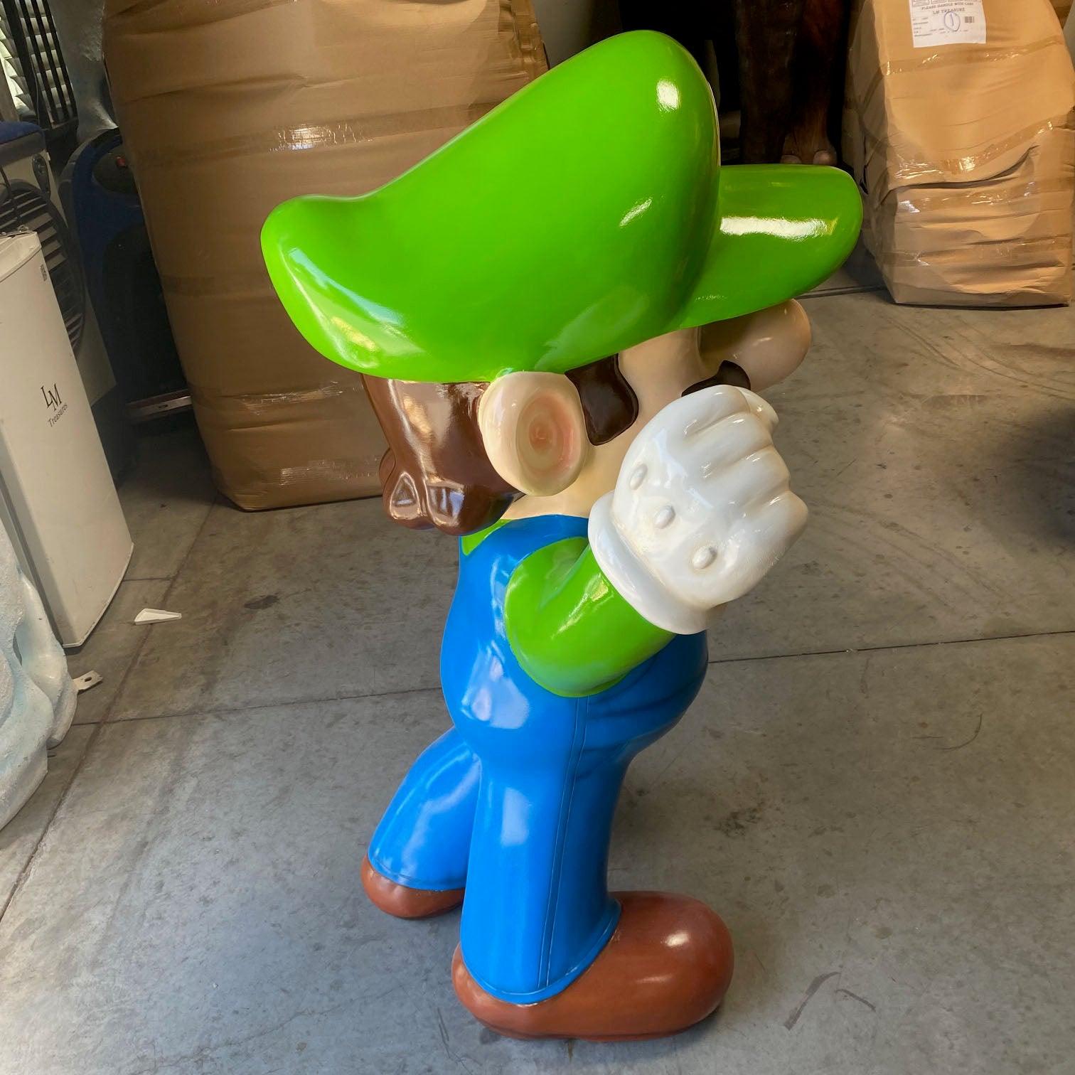 Small Green Jumper Boy Statue - LM Treasures Prop Rentals 