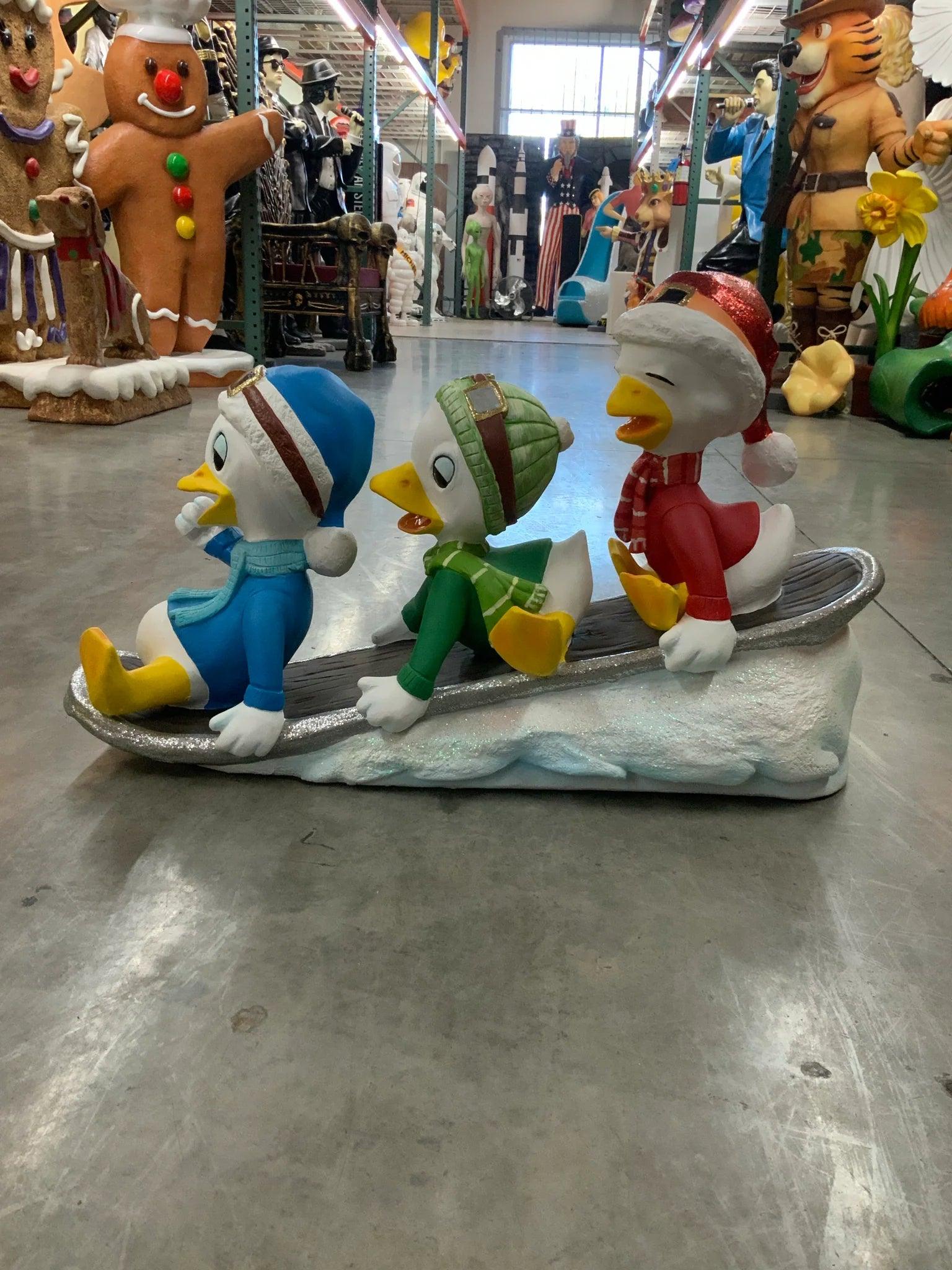 Small Ducklings On Snowboard Statue - LM Treasures Prop Rentals 