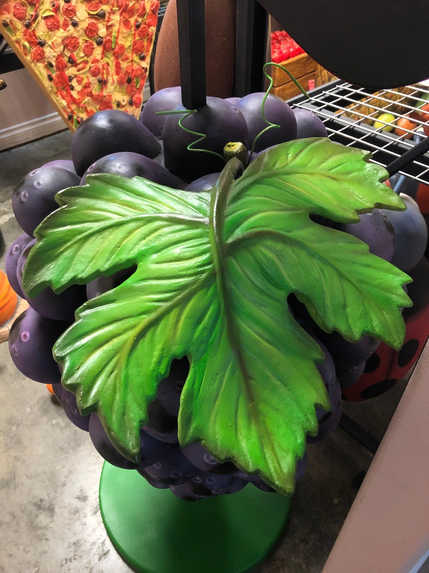 Purple Grapes With Menu Statue