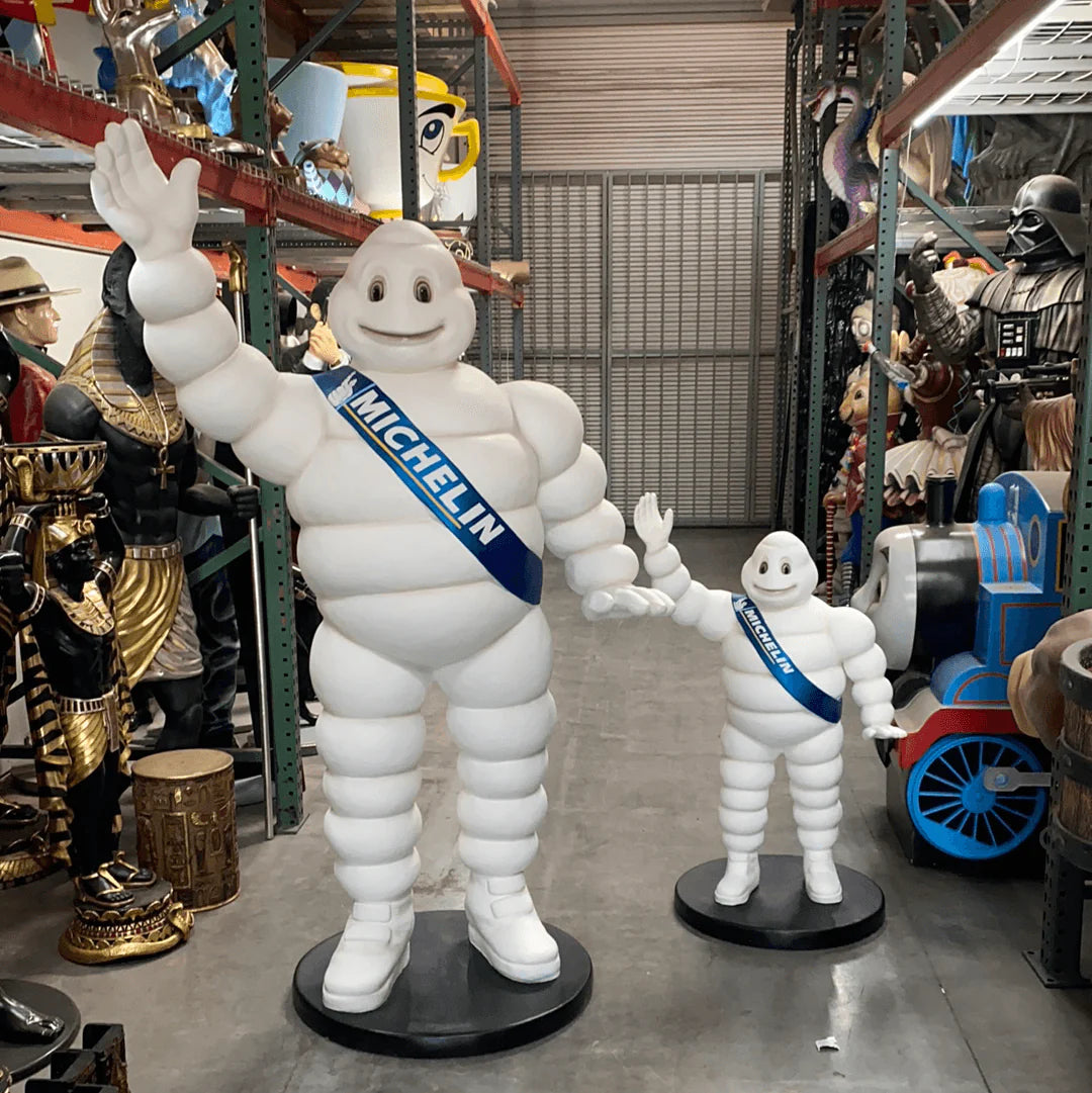 Tire Man Waving Small Statue