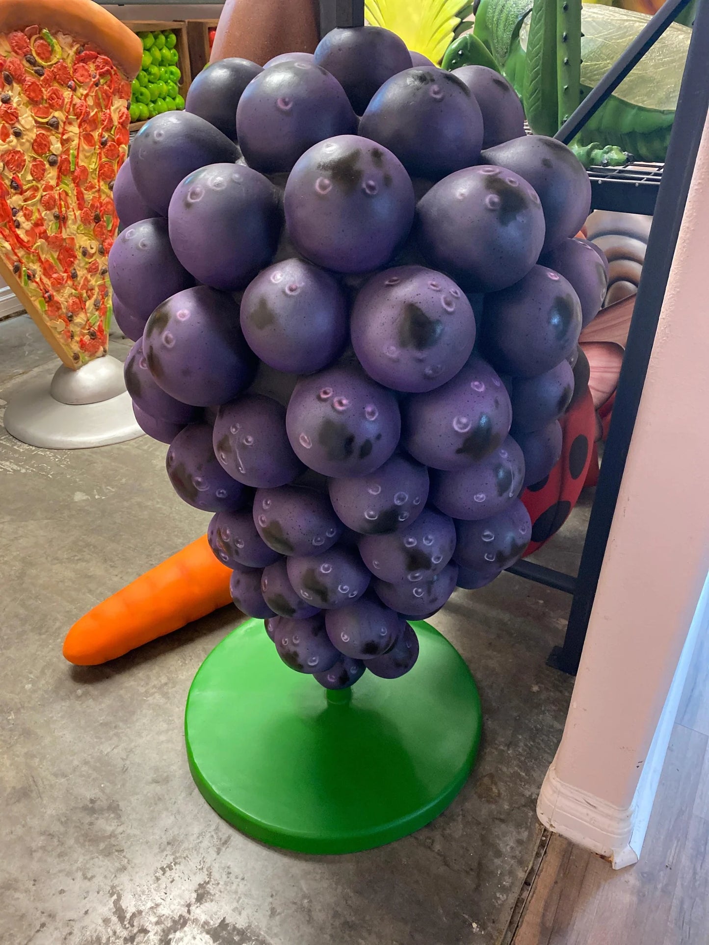 Purple Grapes With Menu Statue