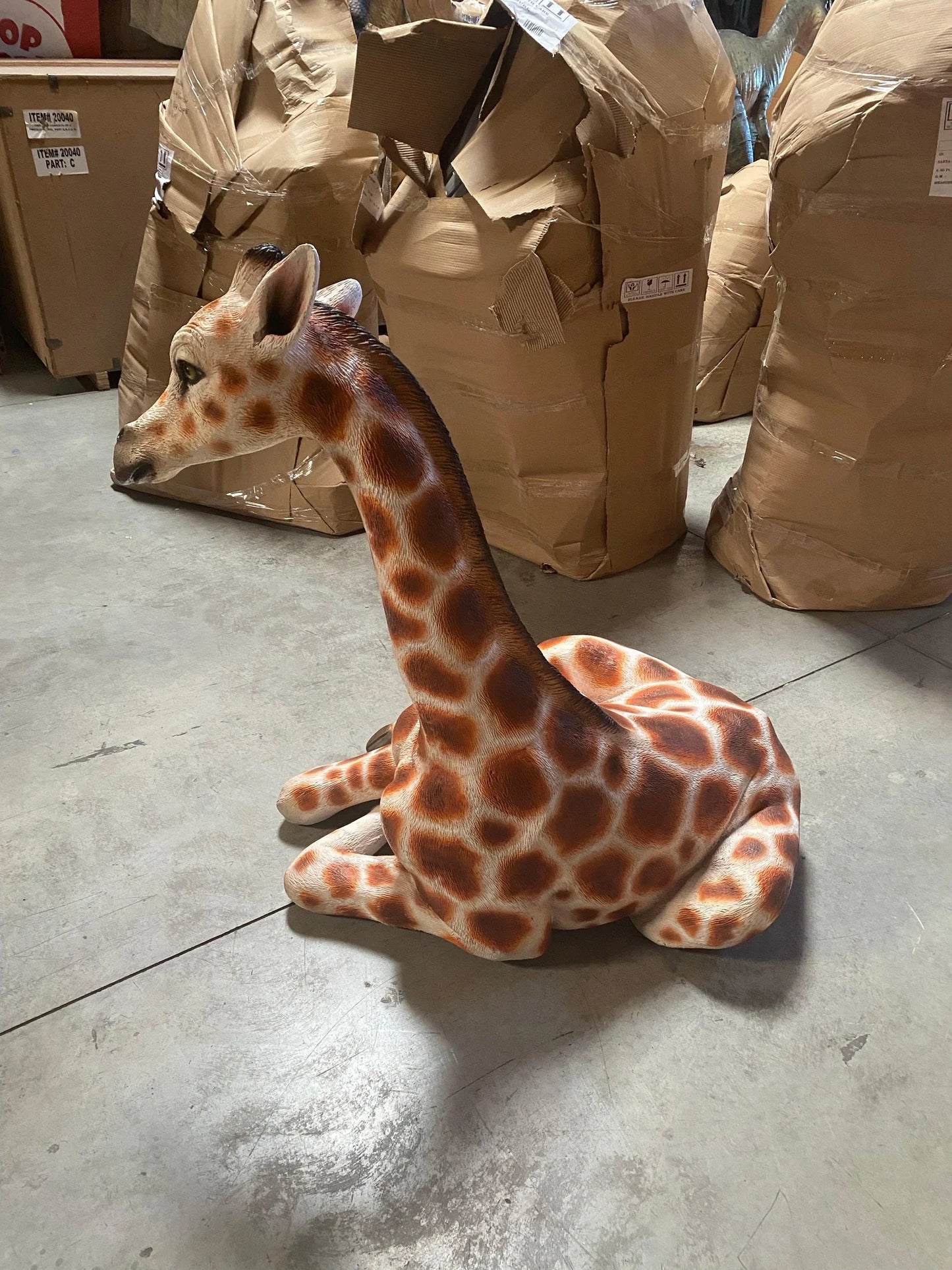 Small Laying Giraffe Statue