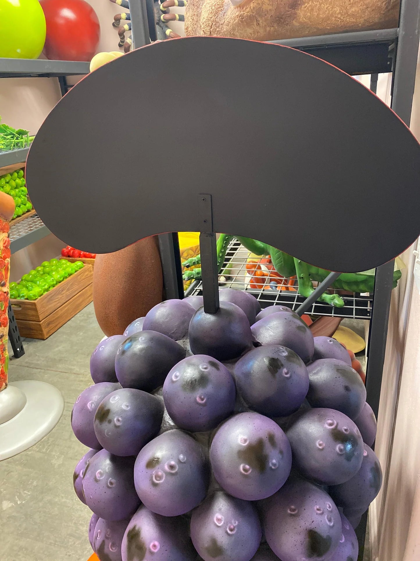 Purple Grapes With Menu Statue