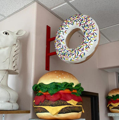 Hanging White Donut Statue - LM Treasures Prop Rentals 
