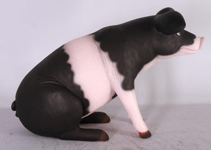 Baby Sitting Black And Pink Pig Statue