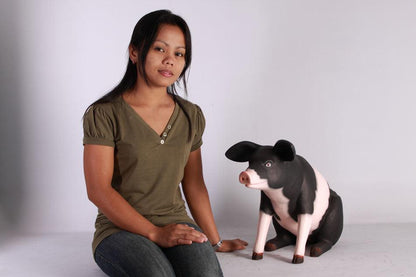 Baby Sitting Black And Pink Pig Statue - LM Treasures Prop Rentals 