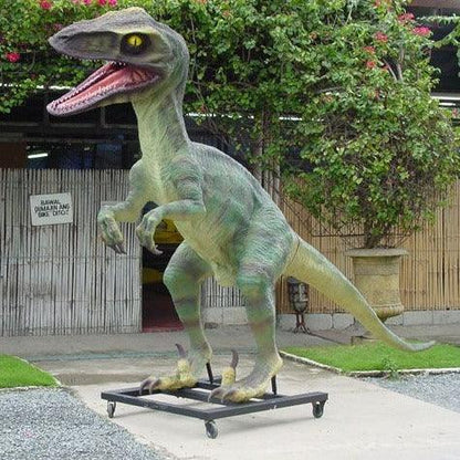 Green Raptor Dinosaur Life Size Statue - LM Treasures Prop Rentals 