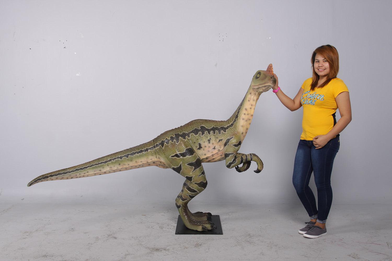 Dilong Paradoxus Dinosaur Statue - LM Treasures Prop Rentals 