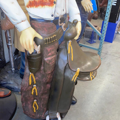 Western Cowboy With Saddle Life Size Statue