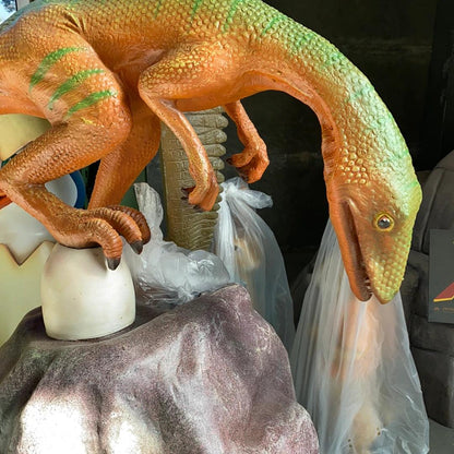 Compsognathus Dinosaur On Rock Statue - LM Treasures Prop Rentals 