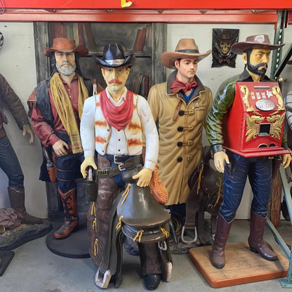 Western Cowboy With Saddle Life Size Statue - LM Treasures Prop Rentals 