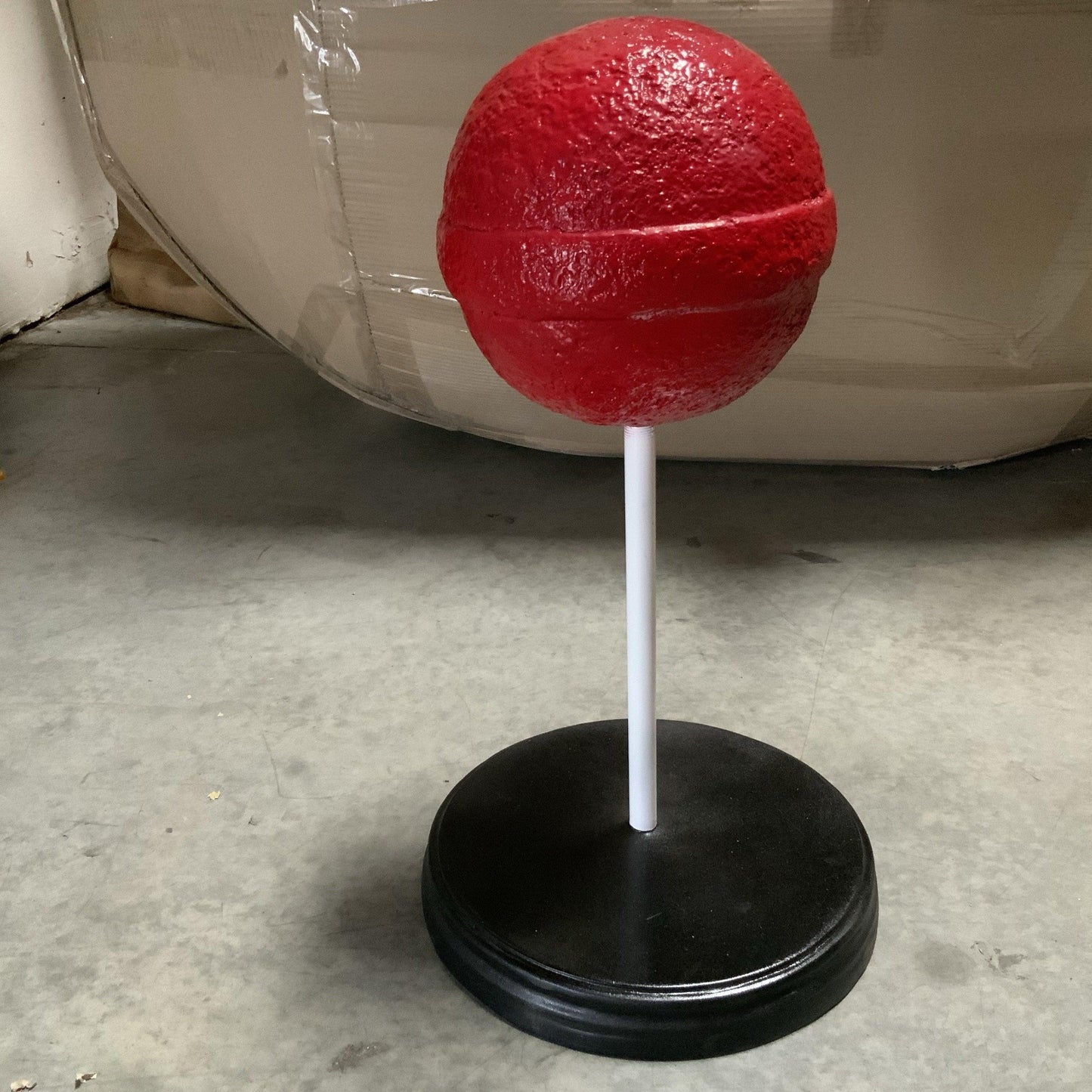 Small Red Sugar Pop Over Sized Statue - LM Treasures Prop Rentals 